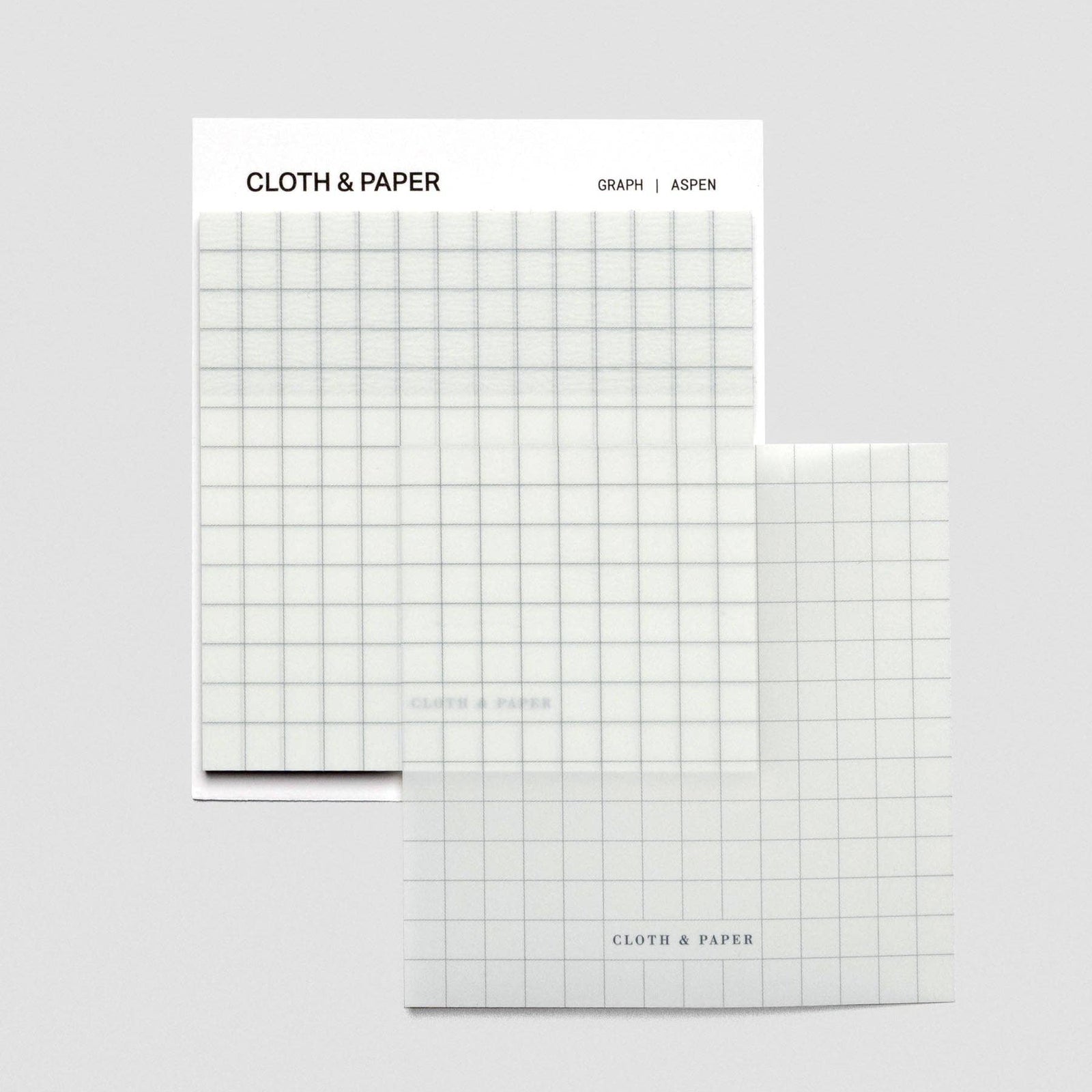 Graph paper with grid lines on a white background, branded 'Cloth & Paper'.