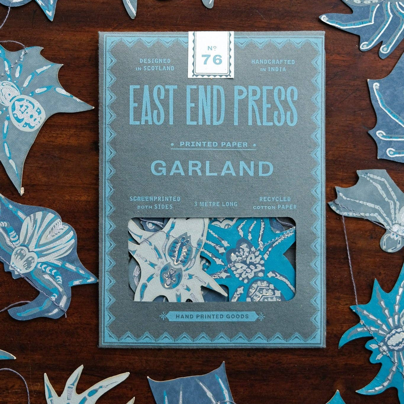 Square image of a spider garland by east end press, designed in scotland and hand screen printed in Jaipur.