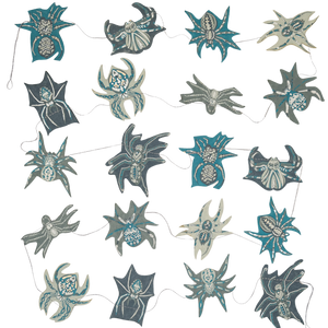 Decorative string banner with spider designs on a white background