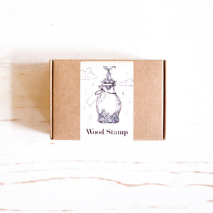 A Log of Atlantis Wood Stamp