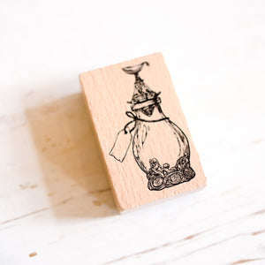 A Log of Atlantis Wood Stamp