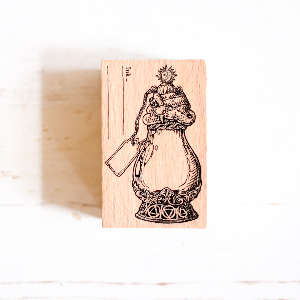 A Log of Elixir Wood Stamp