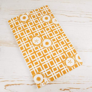 Japanese Camellia Block Printed Notebook Block Printed Notebook Papillon Papers Ochre Grid 